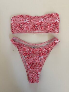 Bikini set with floral pink and white print.